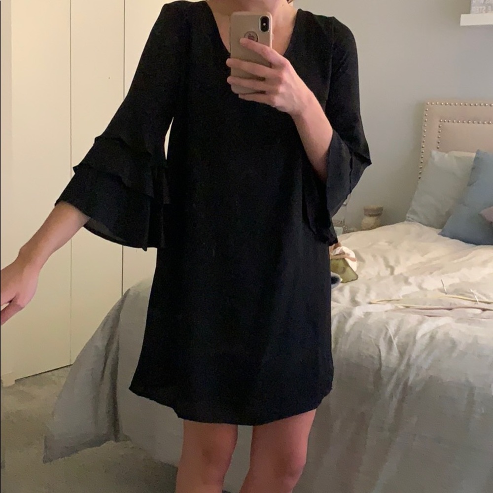 Francesca’s black bell sleeve dress!